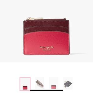 New, never used. Kate Spade cardholder w/key ring.